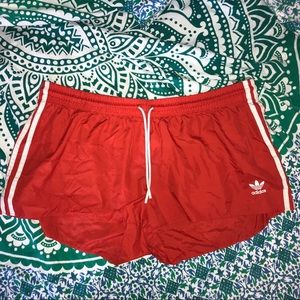 red adidas shorts
